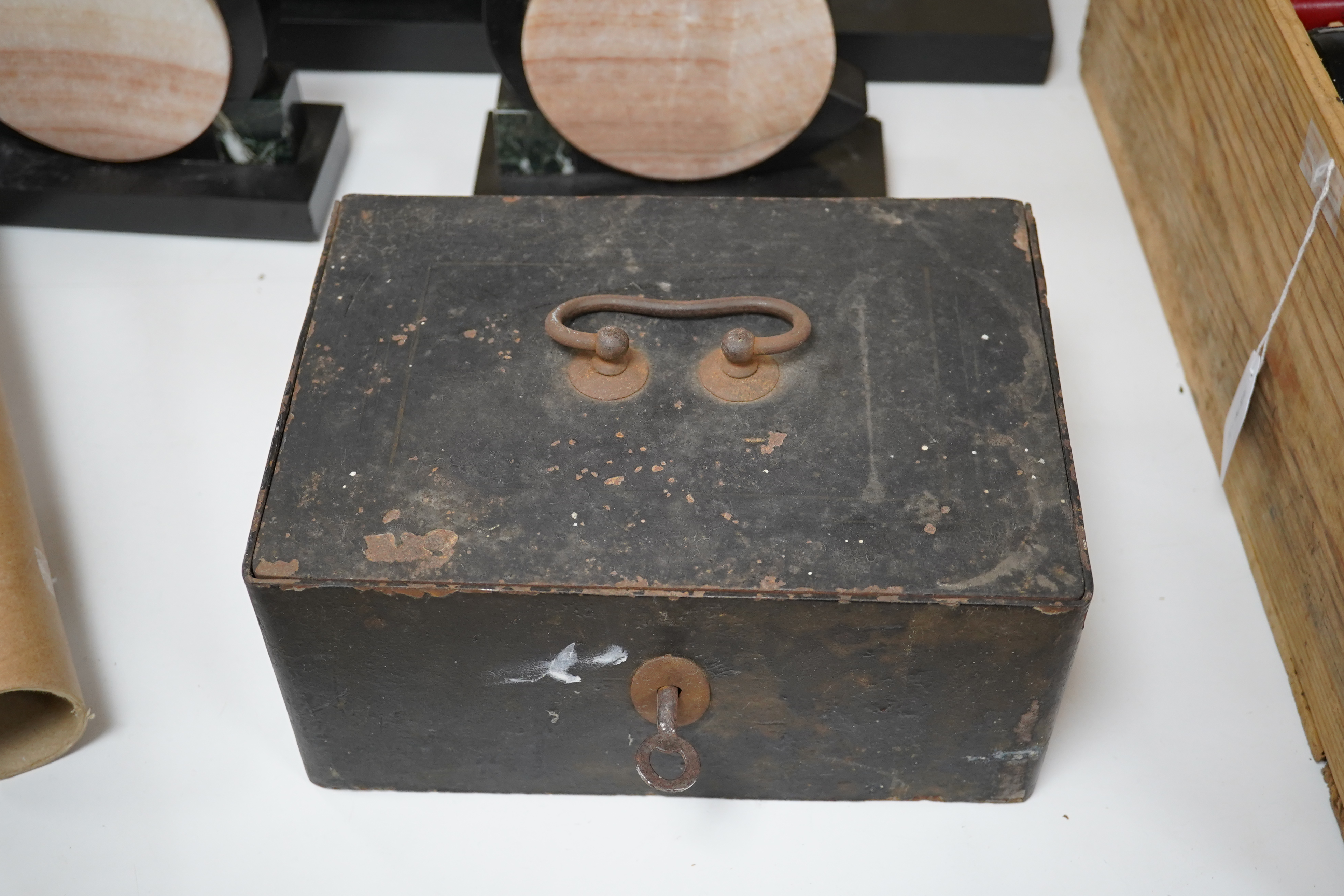 A 19th century strongbox with key, 26cm wide. Condition - worn but working